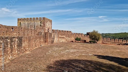 Silves Castle in the South of Portugal. A medieval fortress built by the Moorish empire caliphate in the Algarve region of Portugal.