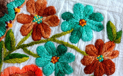 Photos Embroidered flowers on natural white fabric, Serbian folk embroidery