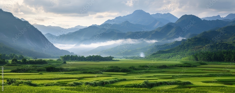 Obraz premium Serene Beauty of an Asian Country: Lush Valleys, Cascading Waterfalls, and Dense Forests at Dawn