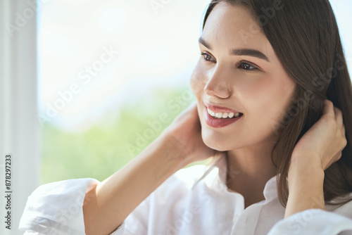 Free Download Smiling Woman In Natural Light, Radiating Happiness And Confidence. Close-Up Shot Emphasizing Clear Skin And Genuine Emotion. Concept Of Natural Beauty, Joy, And Self-Assurance. - GFXLoad
