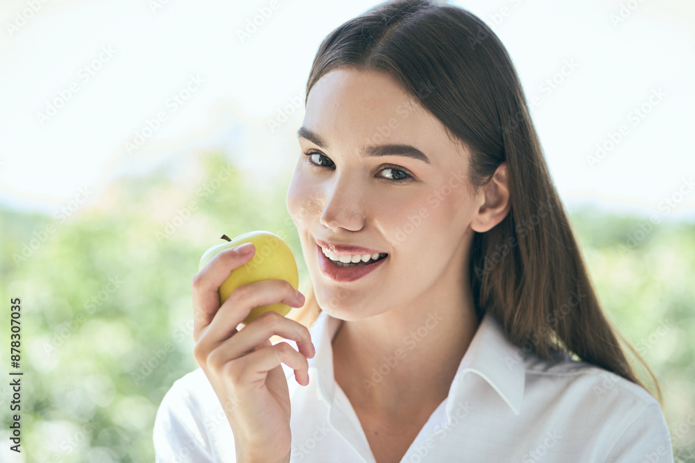 Young Woman Smiling With Healthy Teeth Holding Green Apple Outdoors, Promoting Dental Care, Oral Health, And Wellness Young Woman Smiling With Healthy Teeth Holding Green Apple Outdoors, Promoting Dental Care, Oral Health, And Wellness