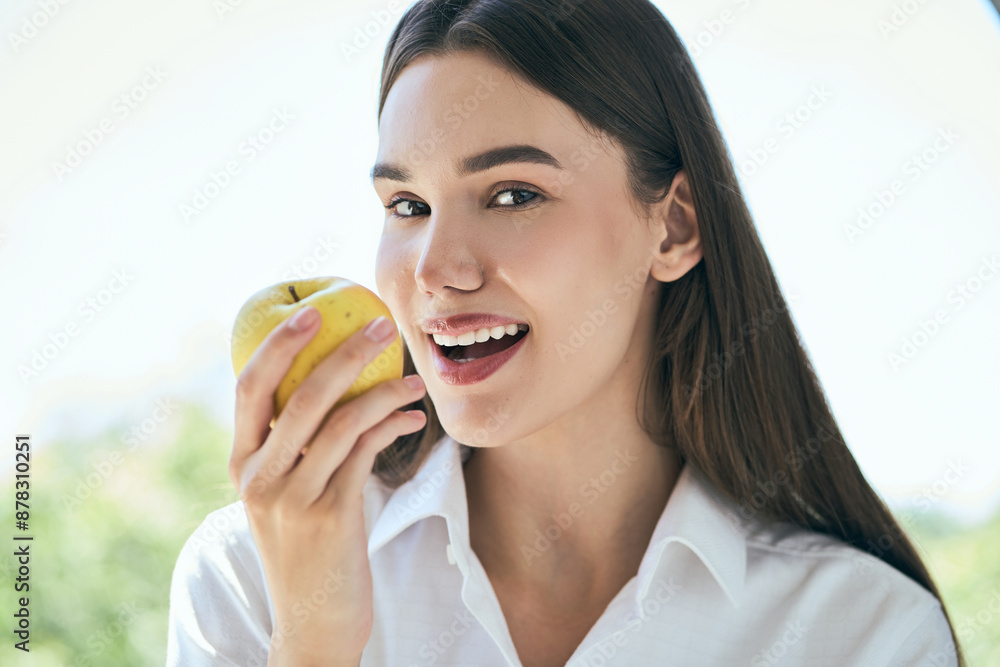Dental Care And Healthy Lifestyle. Young Woman Enjoying Healthy Apple, Smiling With Perfect Teeth Outdoors. Dental Care And Healthy Lifestyle. Young Woman Enjoying Healthy Apple, Smiling With Perfect Teeth Outdoors.