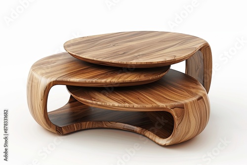 Three nesting wooden coffee tables with a modern organic shape photo