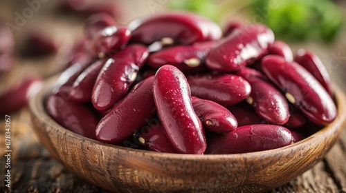 Red kidney beans in a wooden bowl.