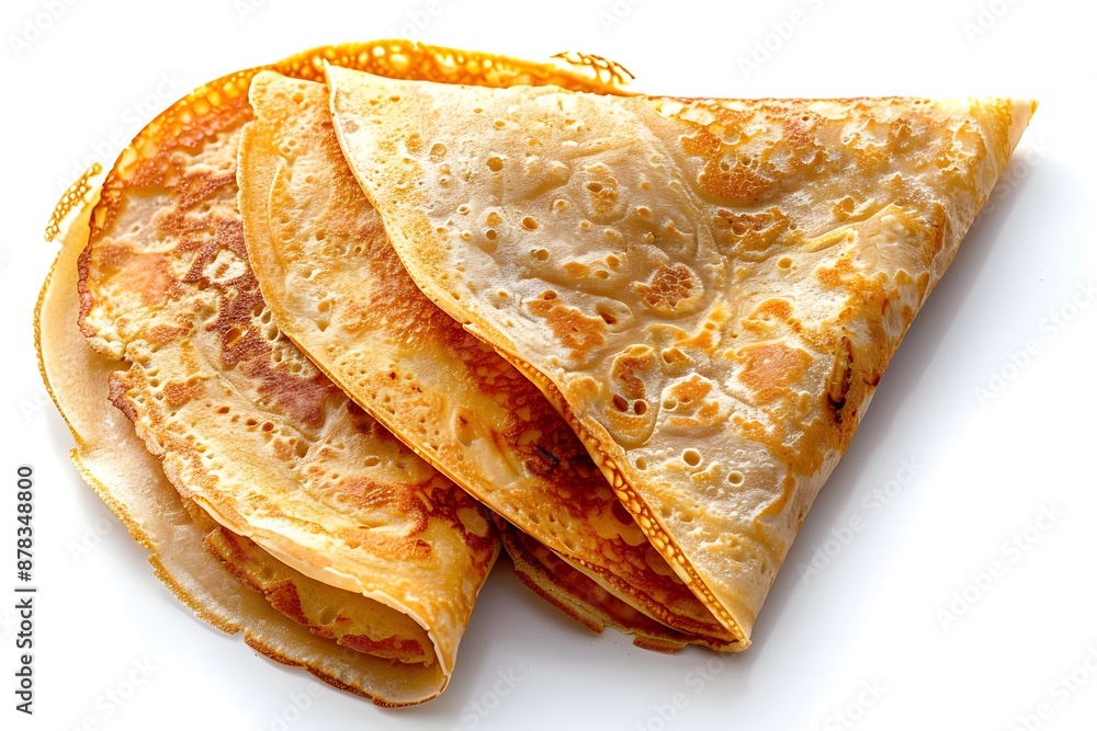 Fototapeta premium Delicious Stack of Golden Crepes on a White Background