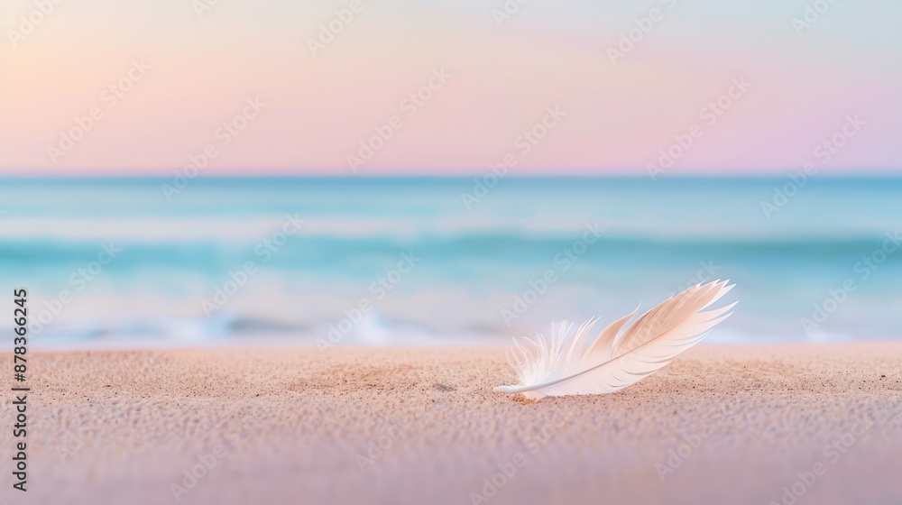 Minimalist beach view with a single seagull feather resting on the sand, against a backdrop of pastel-colored sea and sky