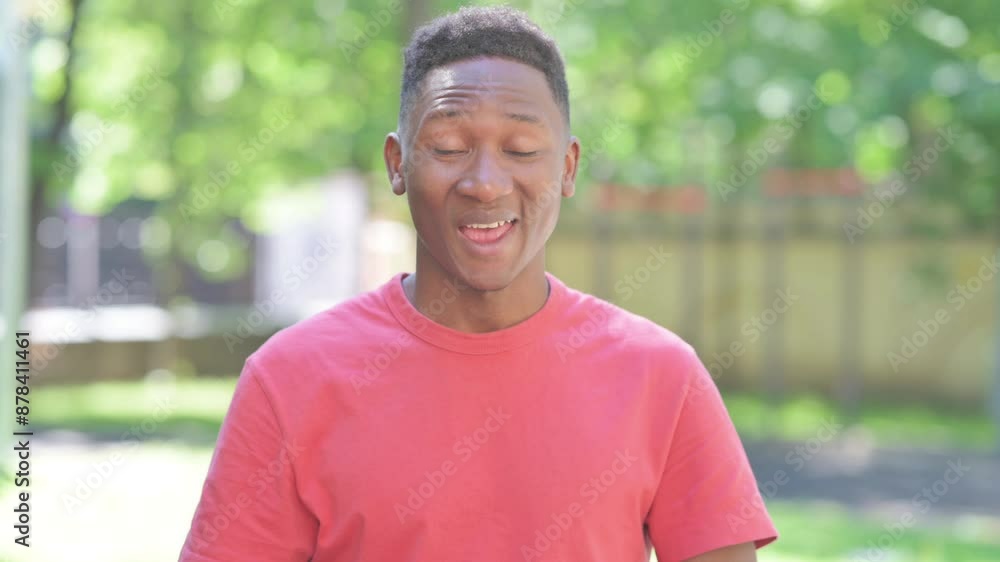 Webcam View of Casual African Man Doing Video Chat while Standing Outdoor Webcam View of Casual African Man Doing Video Chat while Standing Outdoor