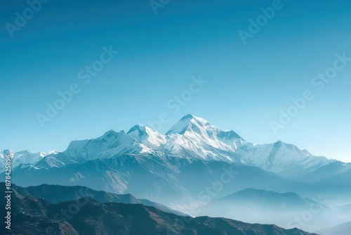 serene snowcapped mountain peaks against a clear blue sky landscape photography