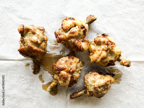 Grilled meat, ribs on the plate with hot sauce
