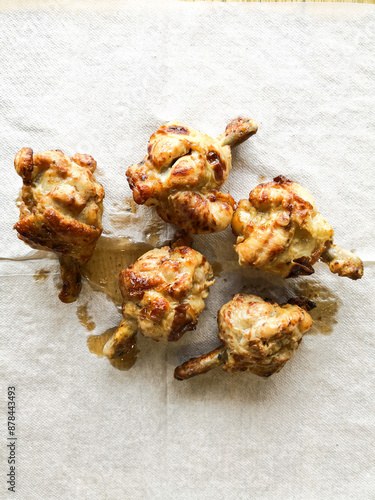 Grilled meat, ribs on the plate with hot sauce
