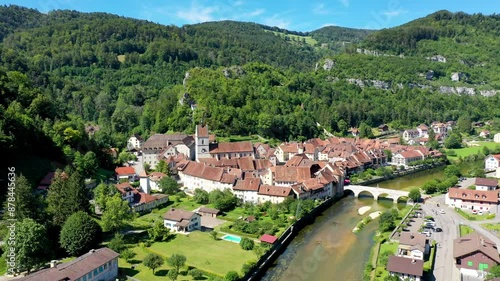 Picturesque Swiss village of Saint-Ursanne on the Doubs River, Switzerland. Village Saint-Ursanne in the district of Porrentruy in the canton of Jura, Switzerland. Saint Ursanne, Jura, Suisse