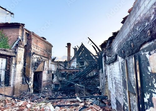 Εκτύπωση καμβά A charred and blackened building in ruins with rubble on the floor after serious fire damage