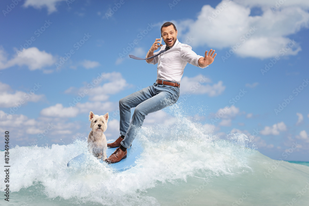 Businessman with a smartphone and a dog on a surfboard Businessman with a smartphone and a dog on a surfboard