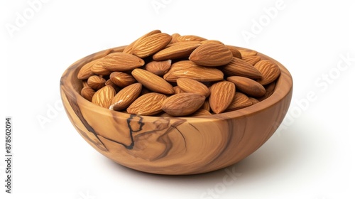 Almonds in a wooden bowl on a white background