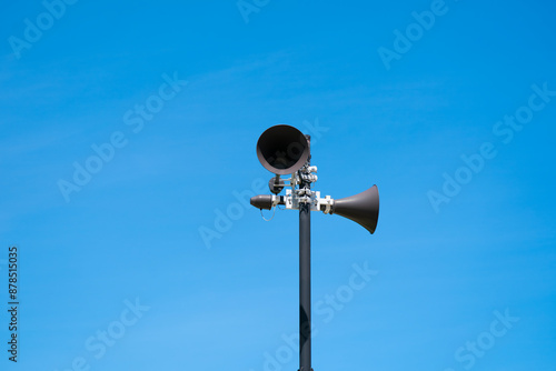 Outdoor sirens, loudspeakers.	