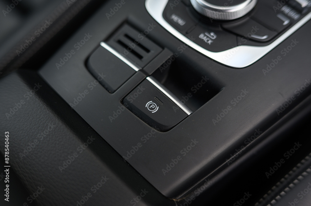 Close-Up of Electronic Parking Brake Control: Modern Vehicle Interior with High-Tech Parking Feature Close-Up of Electronic Parking Brake Control: Modern Vehicle Interior with High-Tech Parking Feature