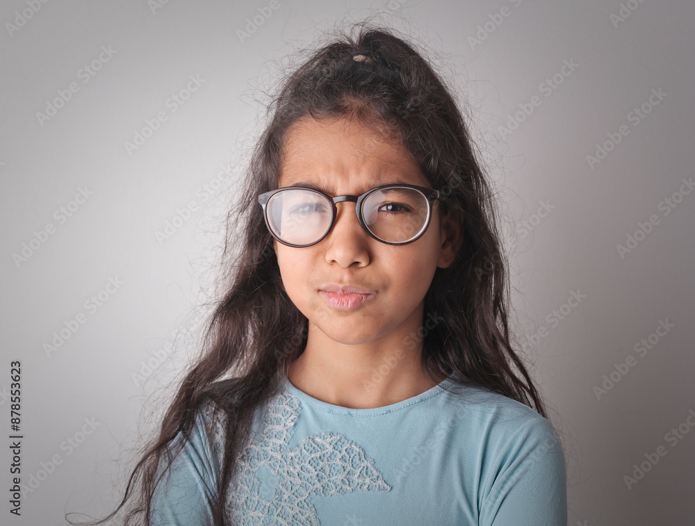 Obraz premium young girl with a pout