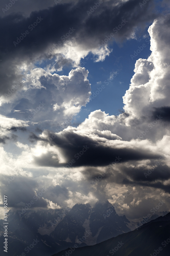 High mountains before rain and sunlight clouds High mountains before rain and sunlight clouds