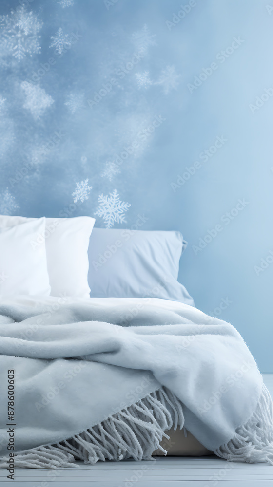 A cozy blue blanket and white pillows on a bed with a snowflake pattern on the wall, perfect for winter and holiday designs.
A cozy blue blanket and white pillows on a bed with a snowflake pattern on the wall, perfect for winter and holiday designs.