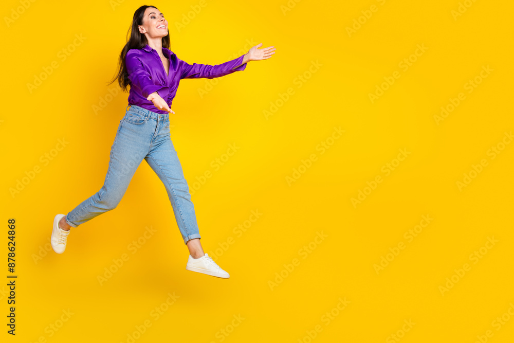 Photo of positive lady jump hold hands hug profile side isolated bright color background Photo of positive lady jump hold hands hug profile side isolated bright color background