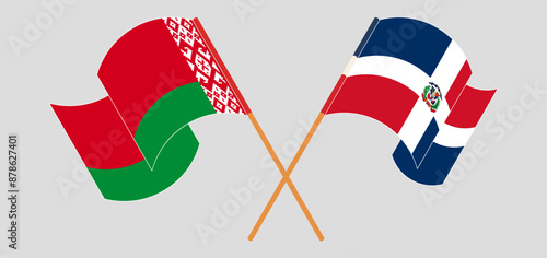Crossed and waving flags of Belarus and Dominican Republic