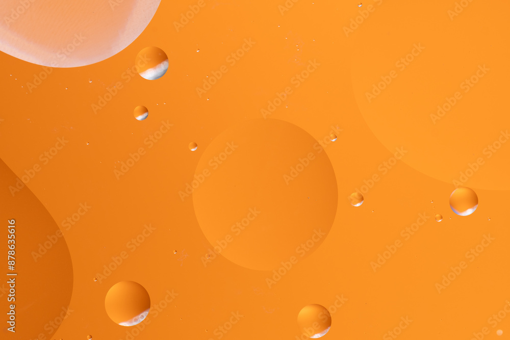 Abstract background with large and small circular shapes in orange. Abstract background with large and small circular shapes in orange.