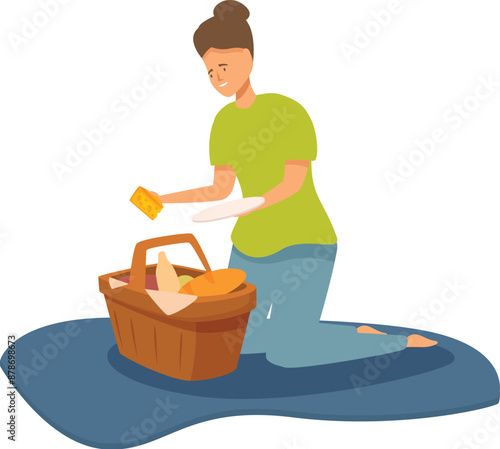 Woman preparing picnic meal, unpacking food from basket on blanket