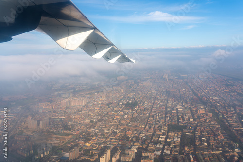 Residential neighborhoods of the city of Bogota Seen from a plane taking off in the morning. Bogota. Colombia. November 22, 2023. photo