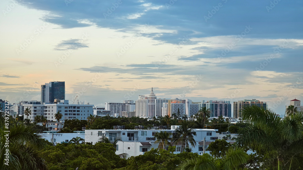 Fototapeta premium Miami Beach, Florida - June 24, 2024: Skyline of hotels lining South Beach as seen from 5th street.