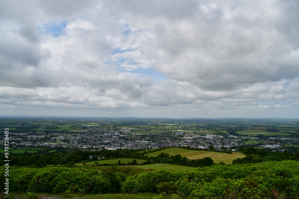 View to Clonmel, Co. Tipperary from Holy Year Cross, Comeragh Mountains range, Glenary, Co. Waterford, Ireland View to Clonmel, Co. Tipperary from Holy Year Cross, Comeragh Mountains range, Glenary, Co. Waterford, Ireland