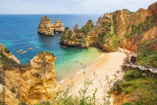 Canvas Print Landscape overlooking Praia do Camilo and canoes near Lagos in Portugal