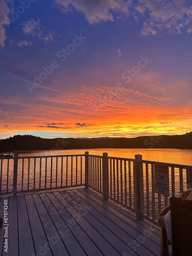 beautiful orange and red sunset over mountain lake