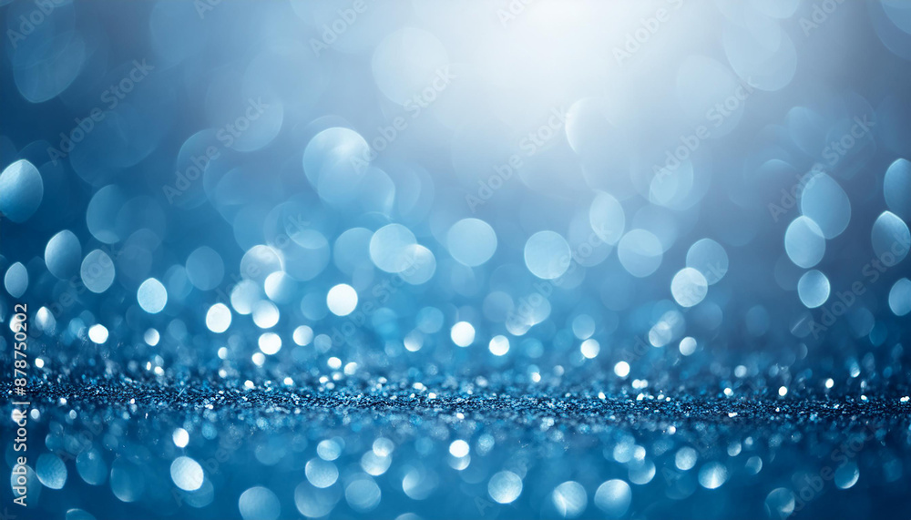 Glittery vibrant blue background with dreamy bokeh effect. Abstract festive backdrop. Glittery vibrant blue background with dreamy bokeh effect. Abstract festive backdrop.