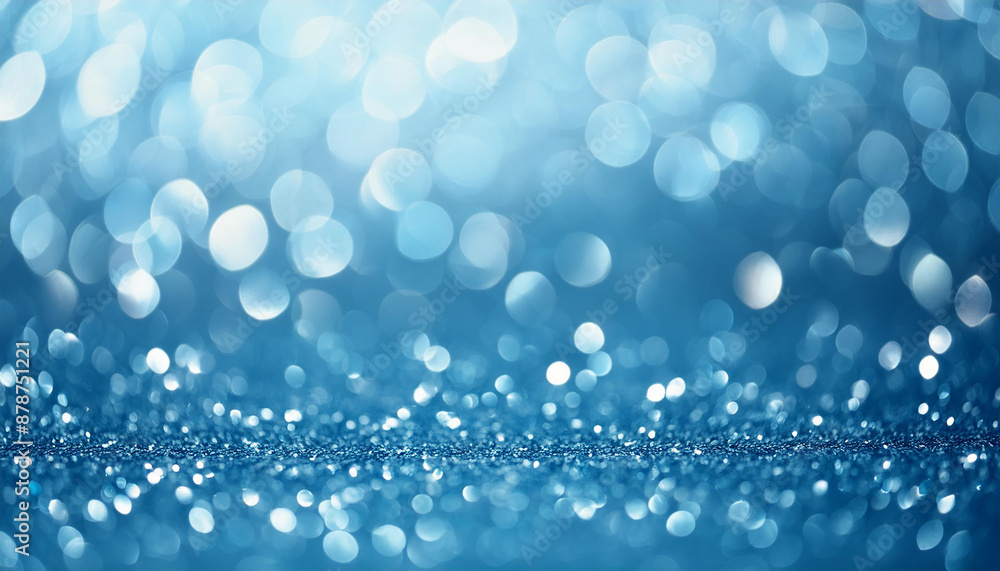 Glittery vibrant blue background with dreamy bokeh effect. Abstract festive backdrop. Glittery vibrant blue background with dreamy bokeh effect. Abstract festive backdrop.