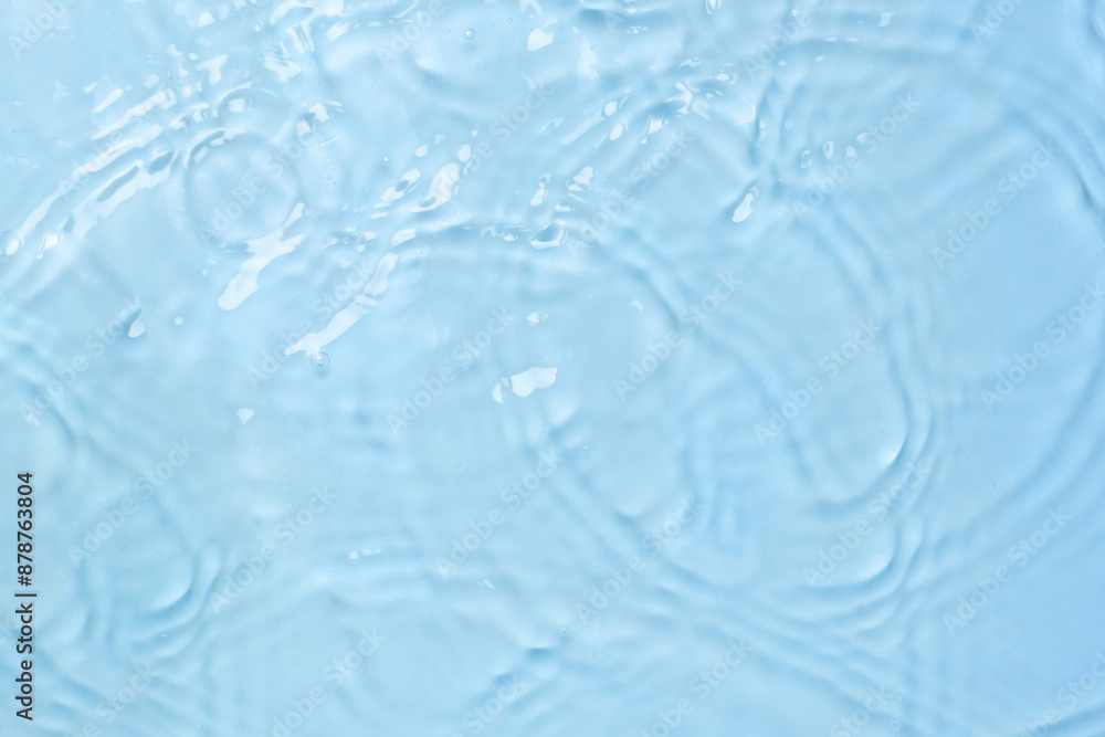 Blue water background with waves and drops top view Blue water background with waves and drops top view