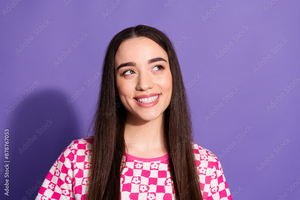 Fototapeta premium Photo of pretty young woman look empty space wear checkered t-shirt isolated on purple color background