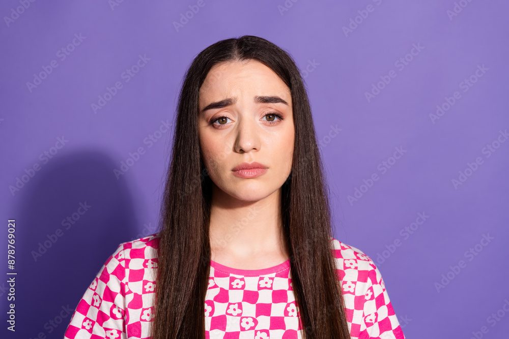 Fototapeta premium Portrait of nice young woman sullen face wear checkered t-shirt isolated on violet color background