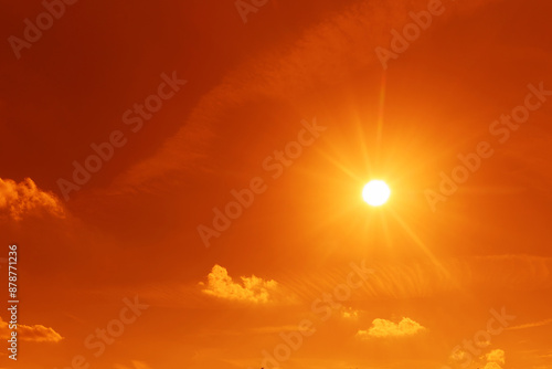 Принти на полотні Hot whether concept. Orange sky with bright sun