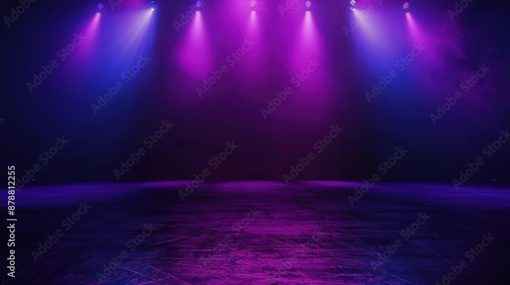 Obraz premium Purple and blue stage lights on dark background
