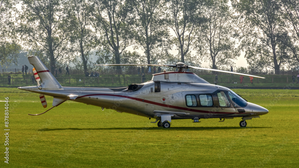 helicopter on the ground waiting for passengers helicopter on the ground waiting for passengers