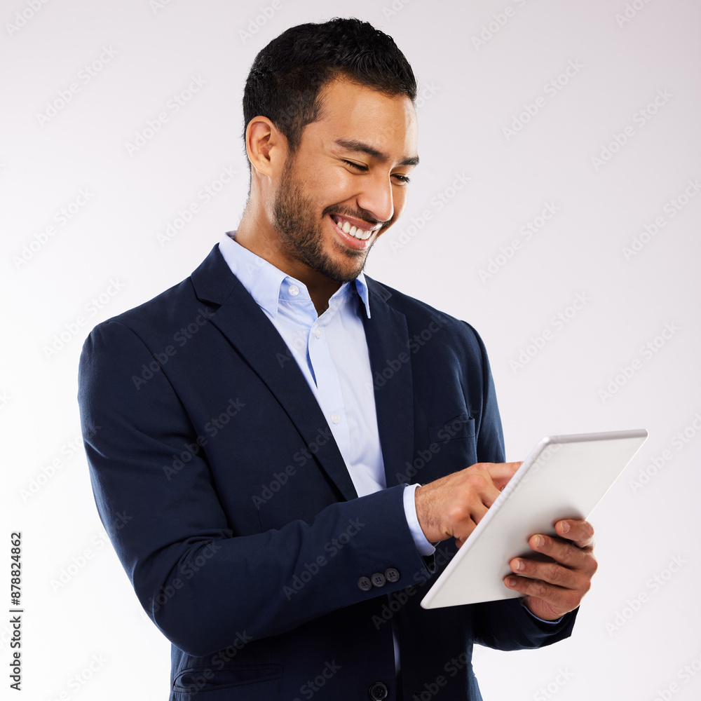 Business, man and happy with tablet in studio on white background on email for good news. Isolated, entrepreneur and smile for communication or networking with loan approval for startup company Business, man and happy with tablet in studio on white background on email for good news. Isolated, entrepreneur and smile for communication or networking with loan approval for startup company