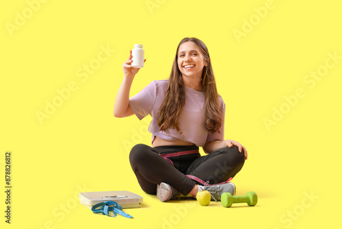 Pretty young woman in sport...