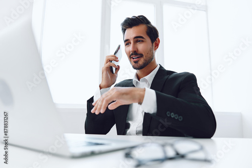 Phone man computer laptop office talk person businessman winner happy smile