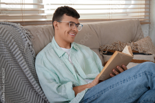 Handsome happy young man in...