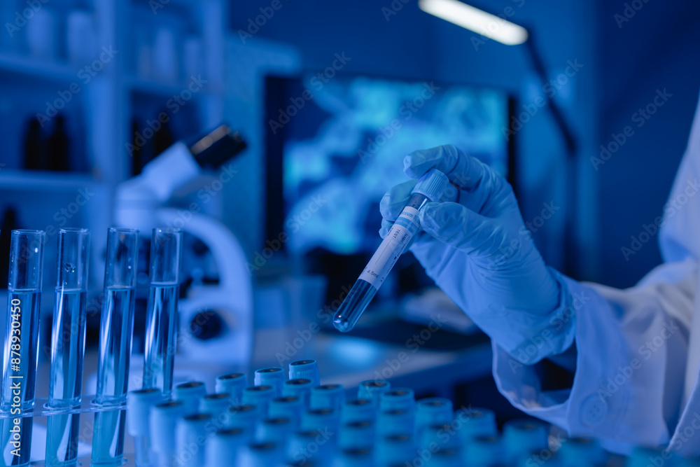 scientist is working on an important liquid inside tube in laboratory, the discovery of a vaccine to protect against currently spreading virus has been discovered, wear gloves and goggles for safety scientist is working on an important liquid inside tube in laboratory, the discovery of a vaccine to protect against currently spreading virus has been discovered, wear gloves and goggles for safety