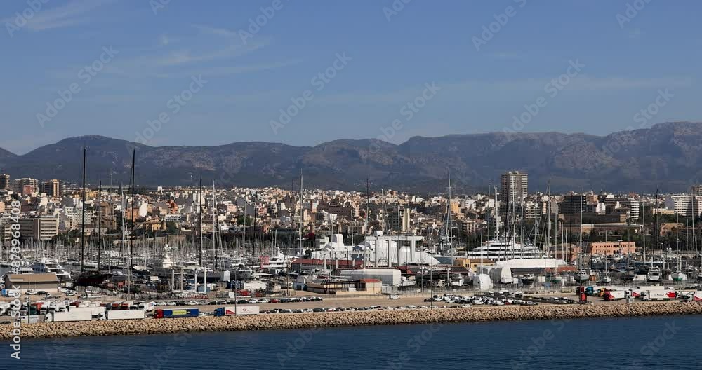 Palma de Mallorca port marina city center from bay. Balearic Islands in Spain. Economic power is tourism. Seaport for ferry boats, ocean cruise ships and cargo. Palma de Mallorca port marina city center from bay. Balearic Islands in Spain. Economic power is tourism. Seaport for ferry boats, ocean cruise ships and cargo.