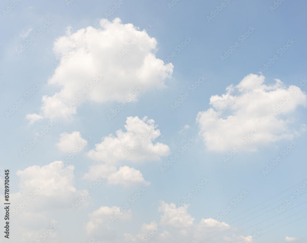 The azure sky is dotted with beautiful white clouds.
The azure sky is dotted with beautiful white clouds.