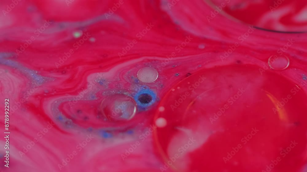 Shimmer drop. Ink spill. Defocused coral pink blue color translucent bubbles floating glitter particles wet texture flow motion abstract art background. Shimmer drop. Ink spill. Defocused coral pink blue color translucent bubbles floating glitter particles wet texture flow motion abstract art background.