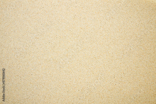 Sand on the beach as background, top view.