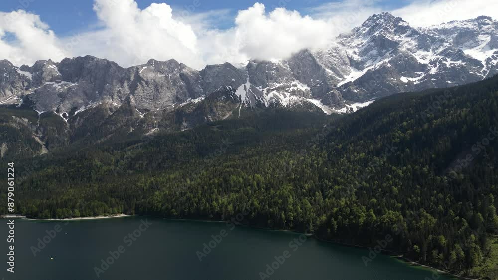 Eibsee Bayern Germany aerial view of snow capped mountains above the lake Eibsee Bayern Germany aerial view of snow capped mountains above the lake